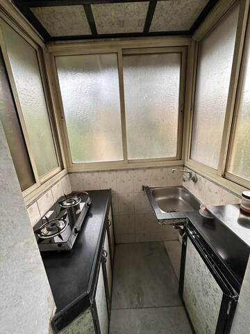 Kitchen in 1 BHK Apartment at Rose Minar CHS, Bandra West – for Rent