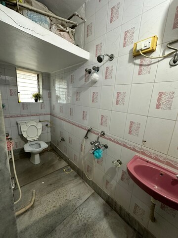 Bathroom in 1 BHK Apartment at Rose Minar CHS, Bandra West – for Rent