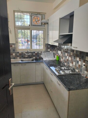 Kitchen in 3 BHK Builder Floor at Ansal API Esencia, Sector 67 – for Sale