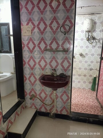 Bathroom in 1 BHK Apartment at Suryodaya Apartments, Seawoods Sector 48 – for Rent