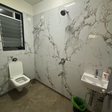 Bathroom in 1 BHK Apartment at Dream Arihant Niwara Sky, Atis Chs – for Sale