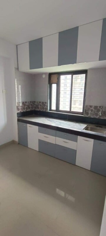 Kitchen in 1 BHK Apartment at Durvas CHS, Nalasopara East – for Sale
