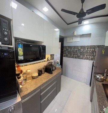 Kitchen in 1 BHK Apartment at Durvas CHS, Nalasopara East – for Sale
