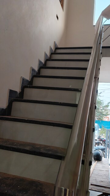 Staircase in 6 BHK Apartment at Dhakoli Village – for Sale