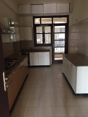 Kitchen in 5 BHK Apartment at Eros Royale Retreat II, Charmwood Village – for Sale