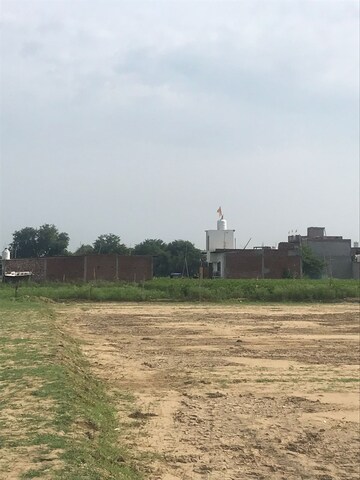 Plot Area in  Plot at Bhopani Village – for Sale