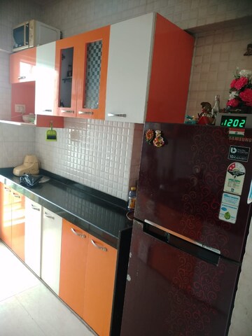 Kitchen in 1 BHK Apartment at Rosa Gardenia, Ghodbunder Road – for Sale
