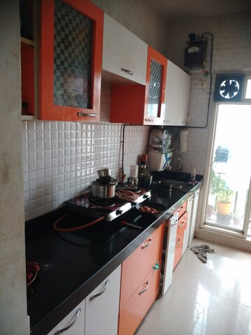 Kitchen in 1 BHK Apartment at Rosa Gardenia, Ghodbunder Road – for Sale
