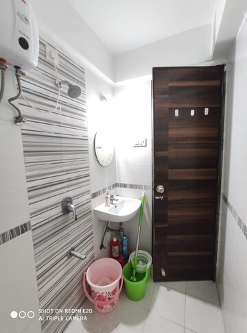 Bathroom in 2 BHK Apartment at Mahavir Kalpavruksha, Ghodbunder Road – for Sale