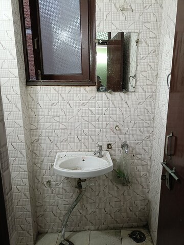 Bathroom in 2 BHK Builder Floor at Mehrauli – for Sale