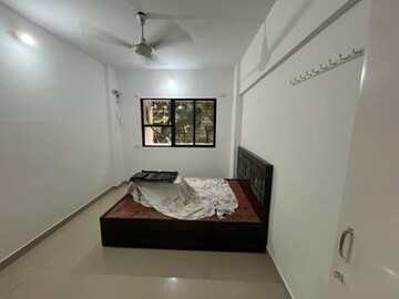 Bedroom in 1 BHK Apartment at Chanchal Kalyan Complex, Yari Road – for Sale