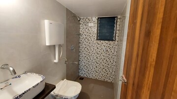 Bathroom in 2 BHK Apartment at Trimurti CHS Badlapur, Kulgaon – for Sale