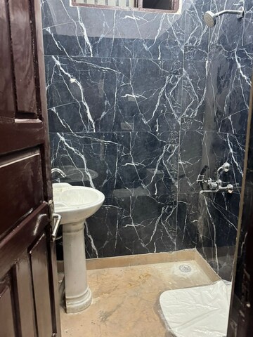 Bathroom in 3 BHK Builder Floor at Green Fields Colony – for Sale