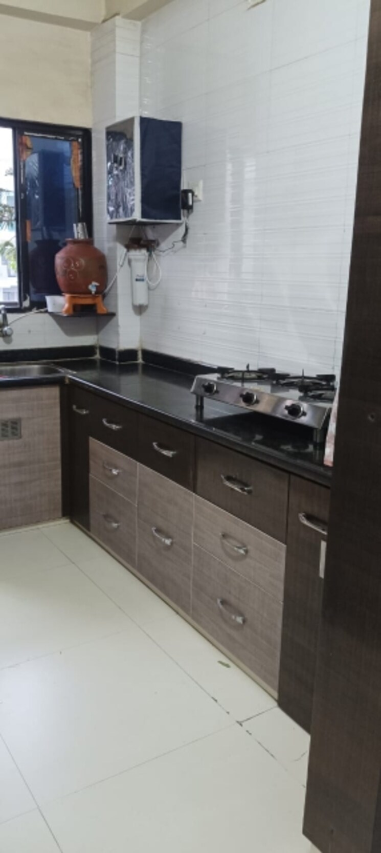 Kitchen, strawberry-sandstone 3 Bedroom 1240 Sq.Ft. Apartment In Mira Road Thane 7763384