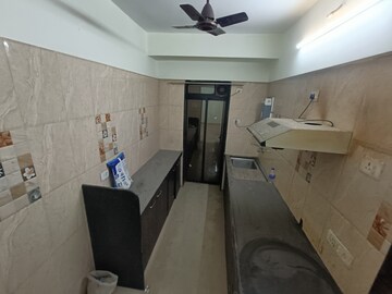 Kitchen in 2 BHK Apartment at Poddar Harmony, Chembur – for Sale