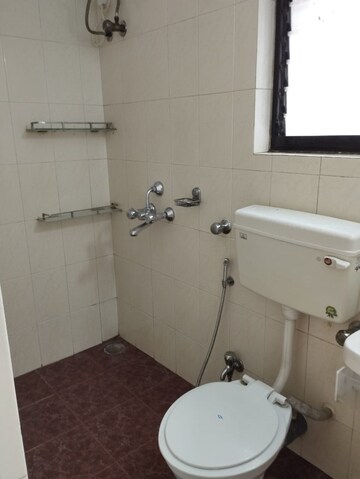 Bathroom in 2 BHK Apartment at Deep Tower, Andheri West – for Sale