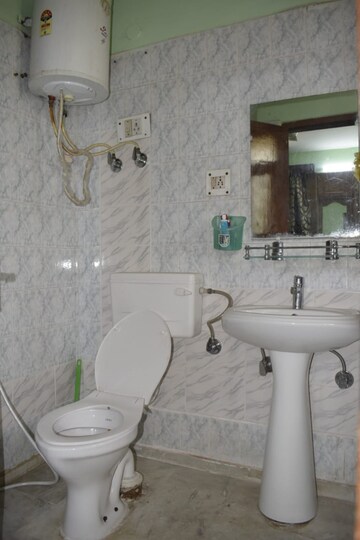 Bathroom in 3 BHK Apartment at Jal Vidyut  Apartment, Sector 21c – for Sale