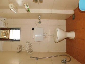 Bathroom in 2 BHK Apartment at Landmark Tower, Dadar East – for Sale