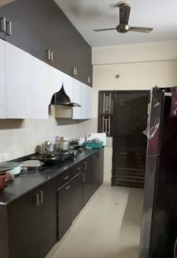 Kitchen in 2 BHK Apartment at Sangwan Heights, Raj Nagar Extension – for Sale