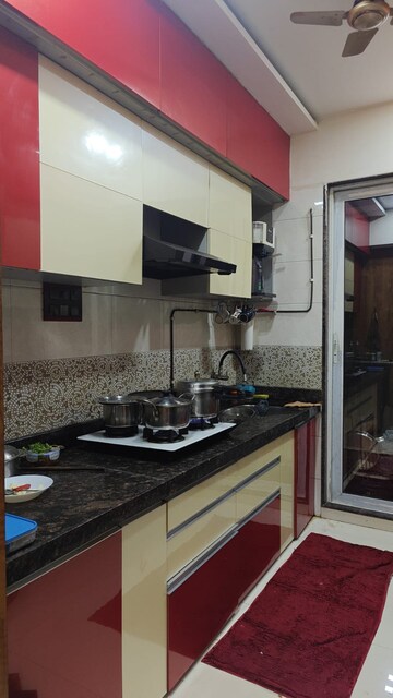 Kitchen in 2 BHK Apartment at Bharat Sanskar CHS, Kharghar Sector 18 – for Sale