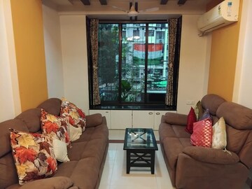 Living Room in 2 BHK Apartment at New Mhada Towers, Andheri West – for Sale