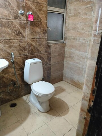 Bathroom in 2 BHK Apartment at Amrapali Silicon City, Sector 76 – for Sale