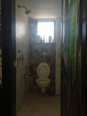 Bathroom in 1 BHK Apartment at Mandakini CHS Mulund, Mulund West – for Sale