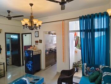 Living Room in 2 BHK Apartment at Viddhi Tower, Mahagunpuram – for Sale