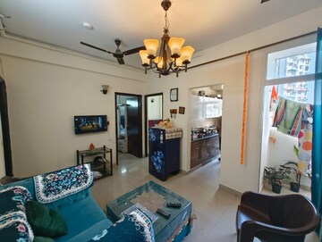 Living Room in 2 BHK Apartment at Viddhi Tower, Mahagunpuram – for Sale
