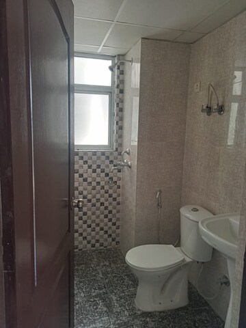 Bathroom in 3 BHK Apartment at Mahagun Mahagunpuram II, Lal Kuan – for Sale