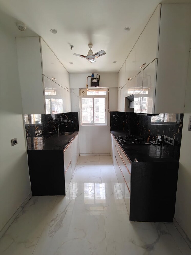 Kitchen, lodha-amara-new-tower 3 Bedroom 955 Sq.Ft. Apartment In Kolshet Road Thane 7766260