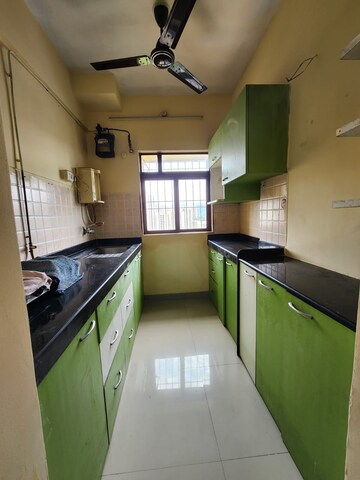 Kitchen in 1 BHK Apartment at Priyamvada CHS, Mulund West – for Sale