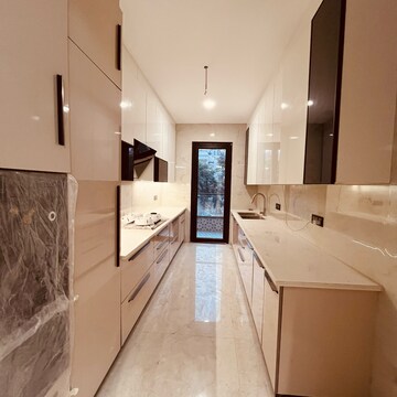 Kitchen in 4 BHK Builder Floor at Ansal API Esencia, Sector 67 – for Sale