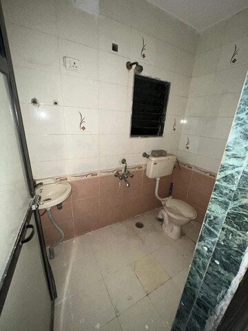 Bathroom in 2 BHK Apartment at Shyam Arcade, Kamothe Sector 18 – for Sale