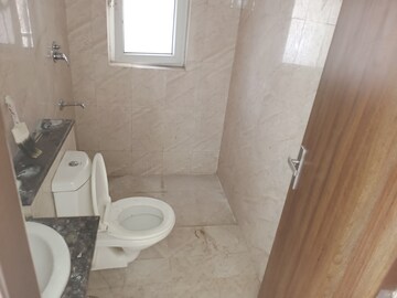 Bathroom in 4 BHK Apartment at Adani Oyster Grande Phase 2, Sector 102 – for Sale