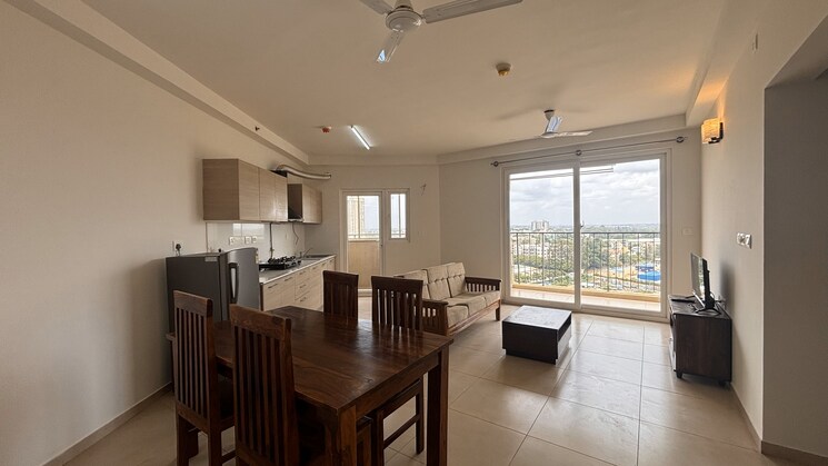 Living Room, bhartiya-nikoo-homes-phase-2 3 Bedroom 1411 Sq.Ft. Apartment In Thanisandra Main Road Bangalore 7766913