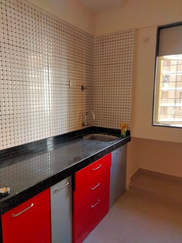 Kitchen in 1 BHK Apartment at Laxmi Avenue D Global City Ph-1, Virar West – for Sale