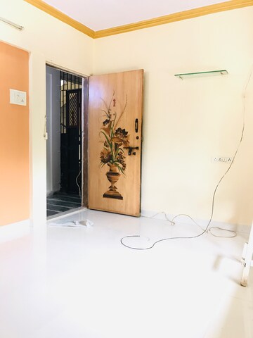 Living Room in 2 BHK Apartment at Veda CHS, Dahisar West – for Sale