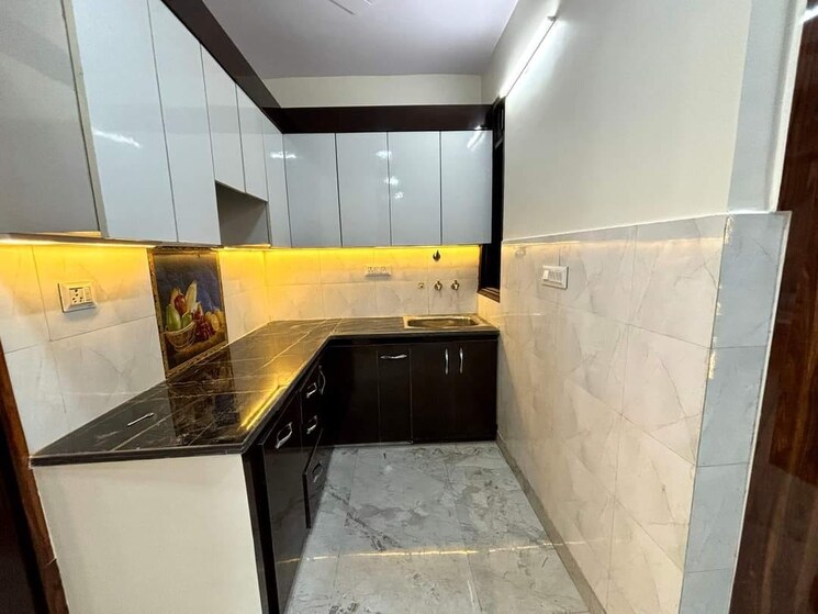 Kitchen, dwarka mor 3 Bedroom 85 Sq.Yd. Builder Floor In Dwarka Mor Delhi 7768584
