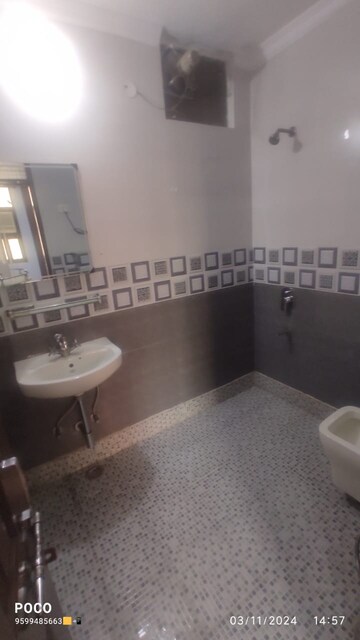 Bathroom in 1.5 BHK Builder Floor at Mehrauli Gurgaon Road – for Rent