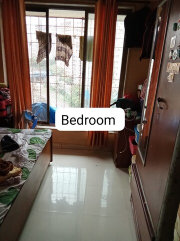 Master Bedroom in 1 BHK Apartment at Mulund East – for Sale