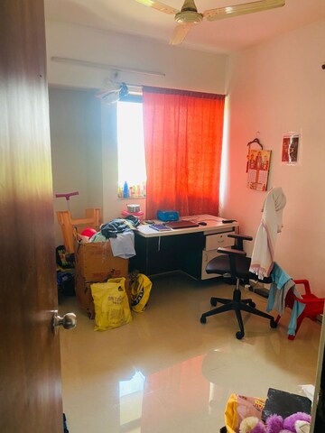 Living Room in 2 BHK Apartment at Lodha Palava City Lakeshore Greens, Dombivli East – for Sale