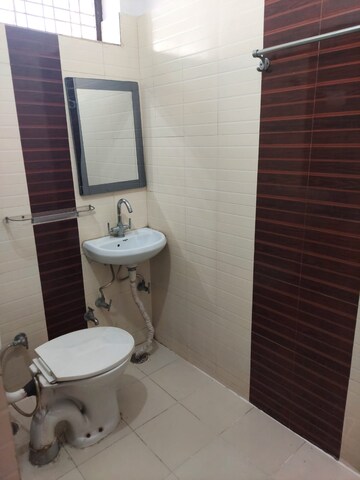 Bathroom in 3.5 BHK Apartment at Orchid Petals, Sector 49 – for Sale