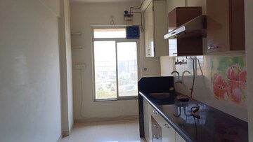 Kitchen in 3 BHK Apartment at Ghodbunder Road – for Sale