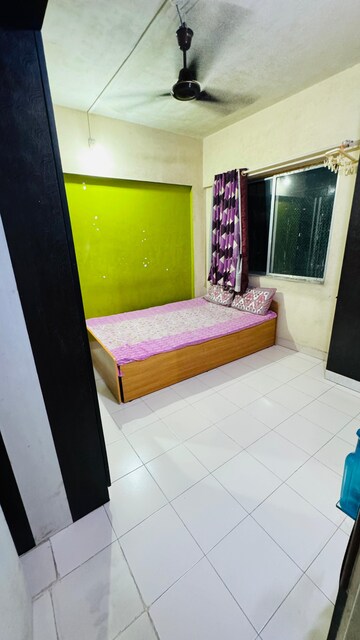 Bedroom in 2 BHK Apartment at Laxmi Nagar Society, Dhanori – for Rent