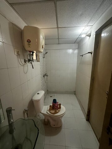 Bathroom in 2 BHK Apartment at Gaurs Global Village, Sain Vihar – for Rent
