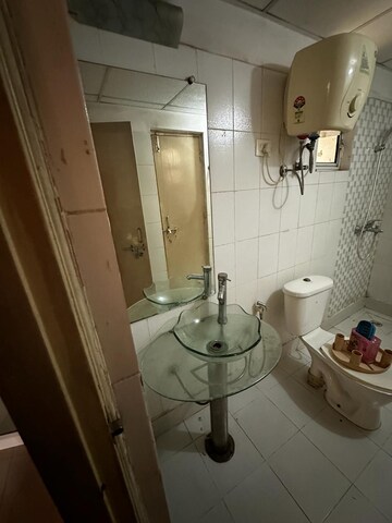 Bathroom in 2 BHK Apartment at Gaurs Global Village, Sain Vihar – for Rent