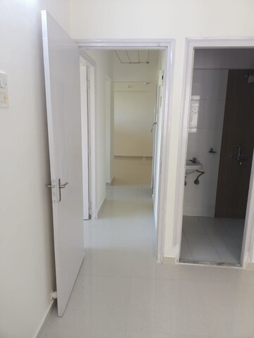 Building Lobby in 2 BHK Apartment at Unnati Woods CHS, Kasarvadavali – for Sale