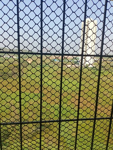 Building Lobby in 2 BHK Apartment at Unnati Woods CHS, Kasarvadavali – for Sale