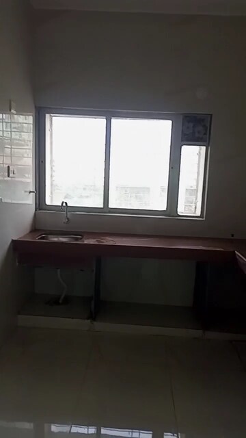 Kitchen in 2 BHK Apartment at Shete Sara Heights, Manjarli – for Sale